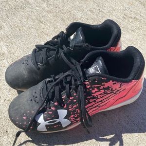 Girls, size 1 Under Armour cleats.